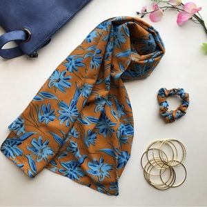 Flowery print scarf with a scrunchy to match.